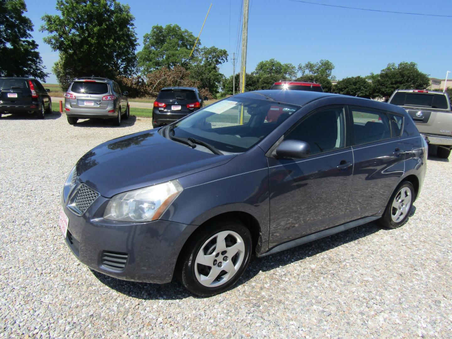 2009 Blue /Gray Pontiac Vibe 1.8L (5Y2SP67819Z) with an 1.8L L4 DOHC 16V engine, 4-Speed Automatic Overdrive transmission, located at 15016 S Hwy 231, Midland City, AL, 36350, (334) 983-3001, 31.306210, -85.495277 - Photo#2